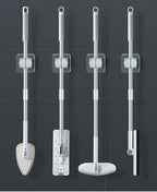 Väggmonterad mopphållare