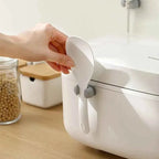 Hållare i silikon för köksredskap