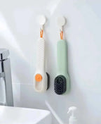 Tvättborste med vätskebehållare