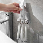 Självhäftande badrumsdispenser