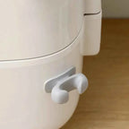 Hållare i silikon för köksredskap