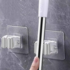 Väggmonterad mopphållare