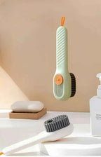 Tvättborste med vätskebehållare