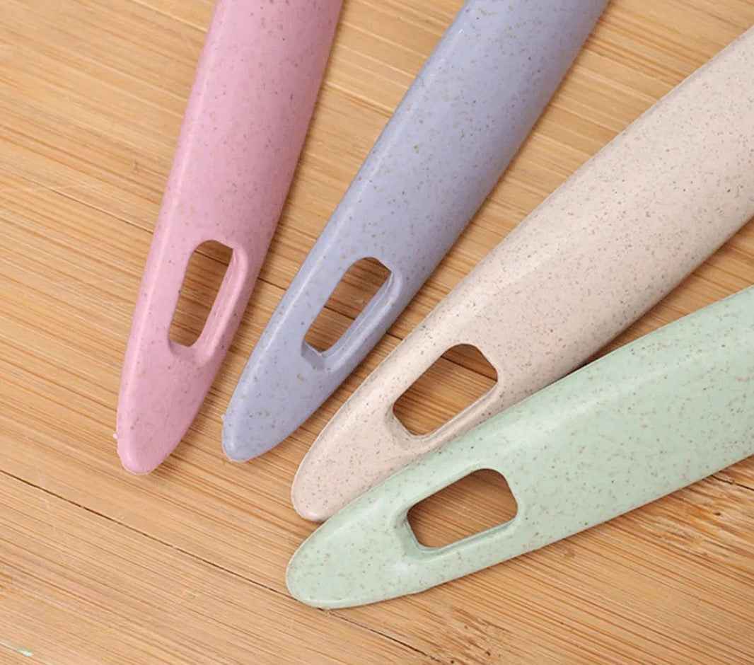 Kökssked med sil 2 i 1