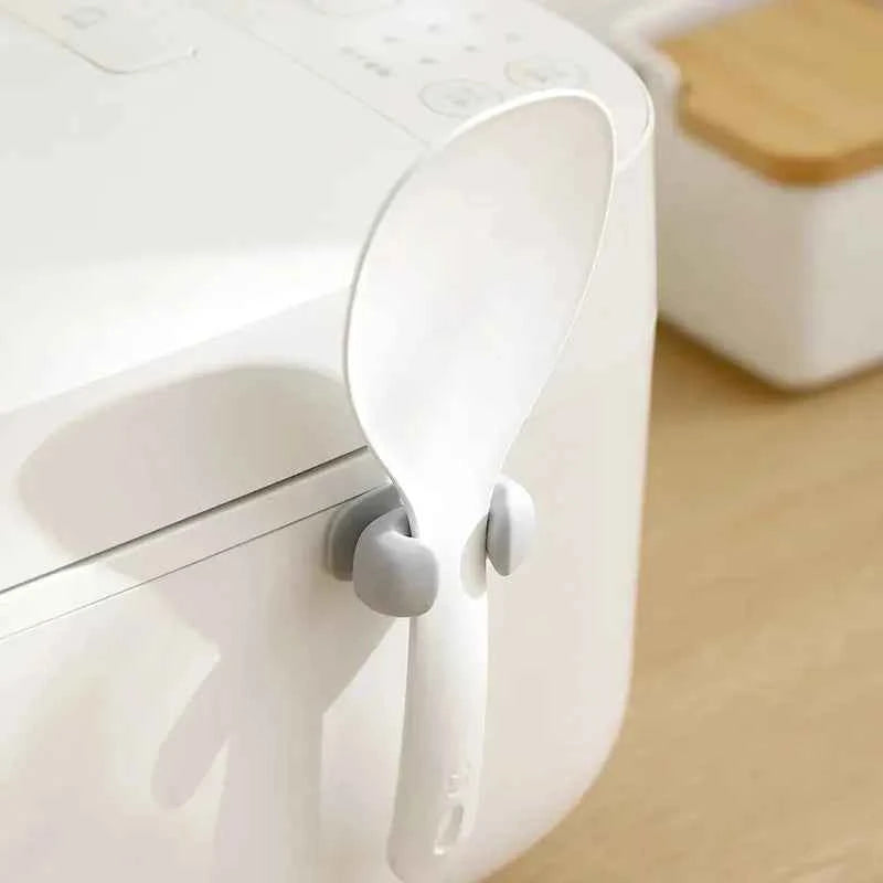 Hållare i silikon för köksredskap